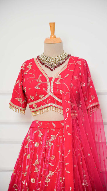 Reddish Pink Handembroidered Lehenga in Fendi Silk