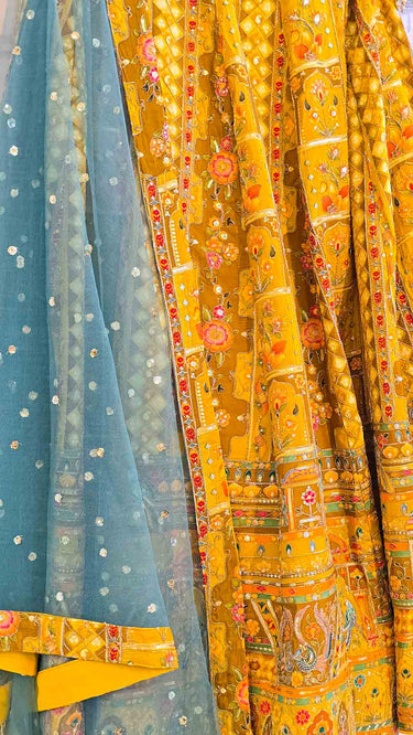 Yellow Figurine Position Print Lehenga with Aqua Green Shawl
