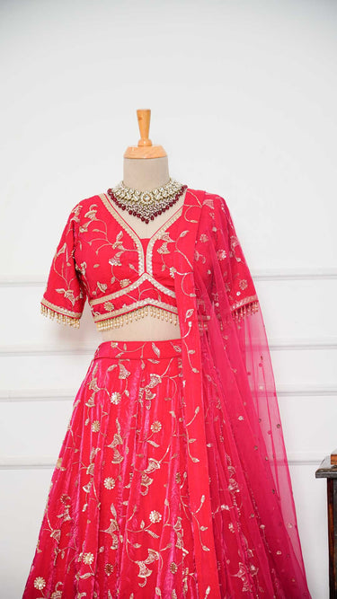 Reddish Pink Handembroidered Lehenga in Fendi Silk