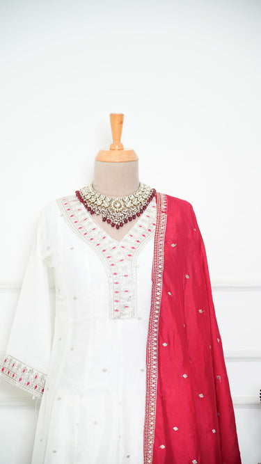 Cream Silk Anarkali Suit with Contrast Red Threadwork